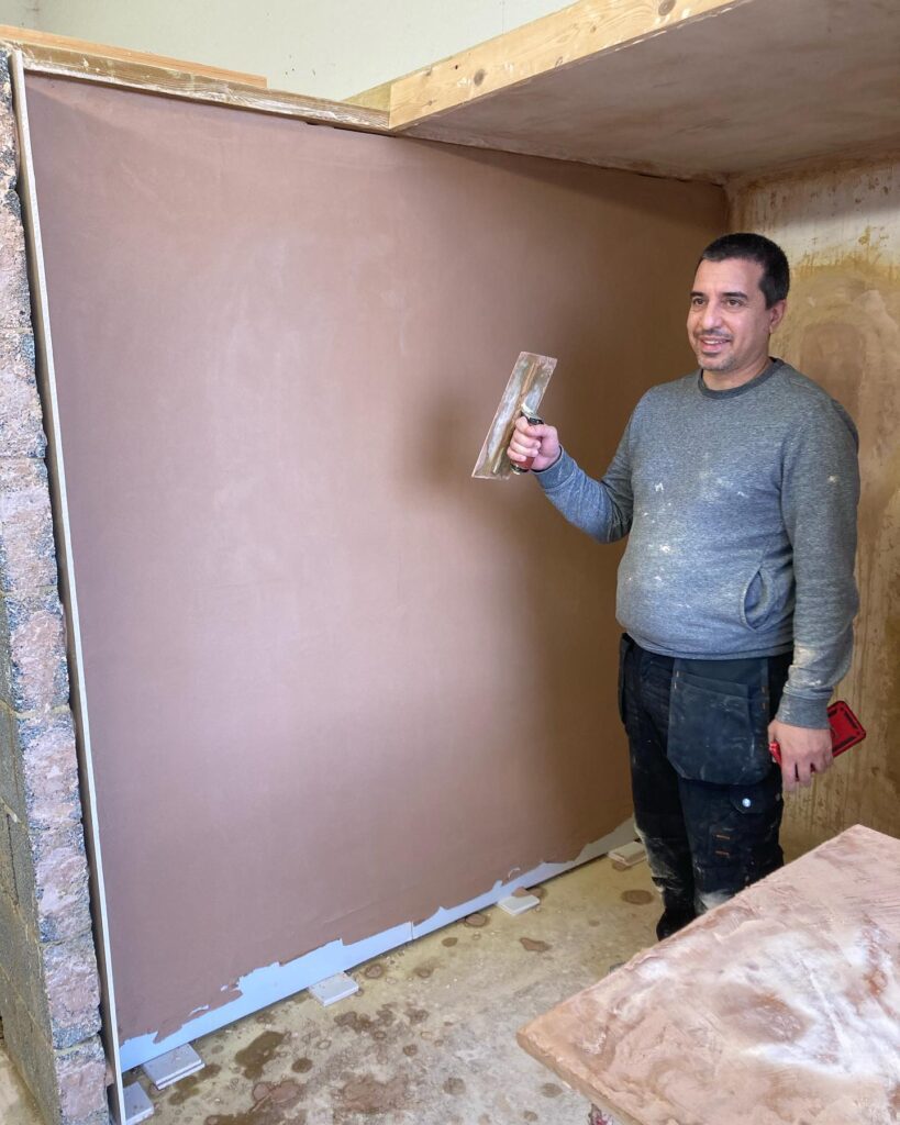 Plastering Course: Another student happy with their work